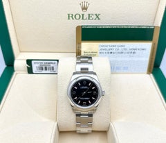 Rolex Oyster Perpetual Midsize 177200 31mm Black and Pink Dial Steel Box Paper