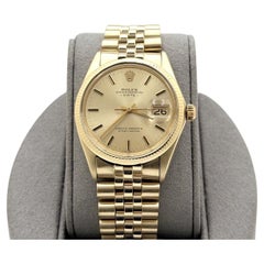 Rolex Date 1503, 34 mm, quadrante color champagne, oro giallo, bracciale Jubilee