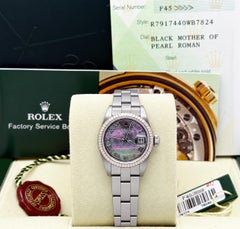 Rolex Datejust para mujer 79174, esfera de nácar negro, caja de acero y oro de 18k, con documentación
