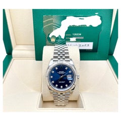 Rolex Datejust 41 126334 del 2023, quadrante con diamanti blu, acciaio e oro 18 carati, cinturino Jubilee, scatola e documenti