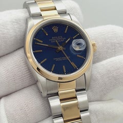 Rolex Datejust 16203, 36 mm, werkseitiges blaues Zifferblatt, 18 Karat Gelbgold, Edelstahl