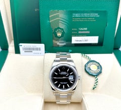 Rolex Datejust 126200 36 mm, quadrante nero, acciaio inossidabile, scatola e documenti
