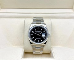 Rolex Datejust 126200 36 mm, quadrante nero, acciaio inossidabile, scatola e documenti