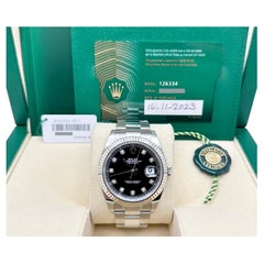 Rolex Datejust 41 126334 del 2023, quadrante nero con diamanti, lunetta in oro 18 carati, cassa in acciaio, con documenti