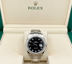 Rolex Datejust 41 126334 del 2023, quadrante nero con diamanti, lunetta in oro 18 carati, cassa in acciaio, con documenti