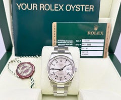 Rolex Date 115200 34mm Silver Roman Dial Stainless Steel Box Papers