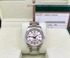 Rolex Date 115200 34mm Silver Roman Dial Stainless Steel Box Papers