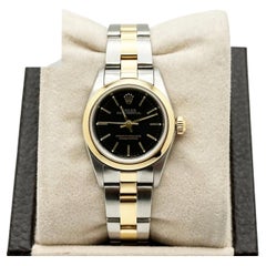 Rolex Ladies Oyster Perpetual 76183 Black Dial 18K Yellow Gold Stainless Steel