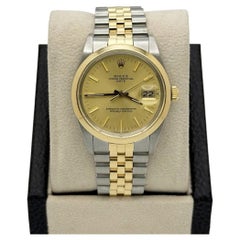 Rolex Date 15003 34mm Champagner Zifferblatt 18k Gelbgold Edelstahl Jubilee