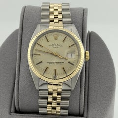Rolex Date 1500 34mm Champagne Dial 14k Yellow Gold Stainless Steel Jubilee