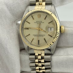 Rolex Date 1500 34mm Champagne Dial 14k Yellow Gold Stainless Steel Jubilee