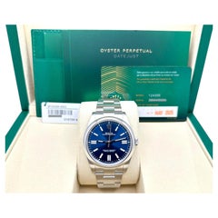 2025 Rolex Oyster Perpetual 124300 41mm Blue Dial Stainless Steel Box Papers