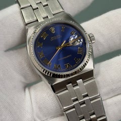 Rolex Datejust Oysterquartz 17014 36mm Blue Roman Dial 18K Gold Bezel Steel