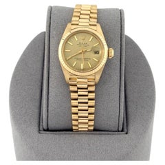 Rolex Damenuhr Datejust President 6917 mit champagnerfarbenem Zifferblatt aus 18 Karat Gelbgold