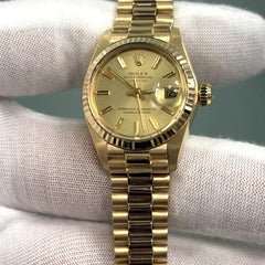 Rolex Damenuhr Datejust President 6917 mit champagnerfarbenem Zifferblatt aus 18 Karat Gelbgold