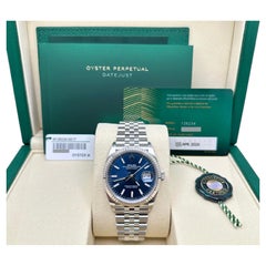 Rolex Datejust 36 126234 de 2026, toute neuve, cadran bleu, lunette en or 18 carats, boîtier en acier, avec papiers
