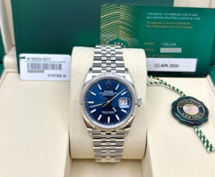 Rolex Datejust 36 126234 de 2026, toute neuve, cadran bleu, lunette en or 18 carats, boîtier en acier, avec papiers