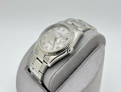 Rolex Datejust 116234 36mm Silver Roman Dial 18k Gold Bezel Stainless Steel