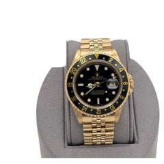 Rolex GMT Master II 16718 40mm Black Dial 18k Yellow Gold Jubilee