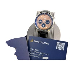 Breitling Navitimer B01 AB0138, 43 mm, kupferfarbenes Zifferblatt, Edelstahlgehäuse, mit Papieren
