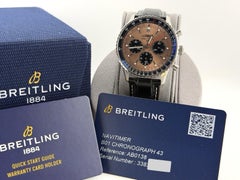 Breitling Navitimer B01 AB0138, 43 mm, kupferfarbenes Zifferblatt, Edelstahlgehäuse, mit Papieren