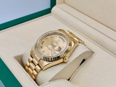Rolex Day Date President 218238 41mm Champagne Roman Dial 18K Gold Box Paper