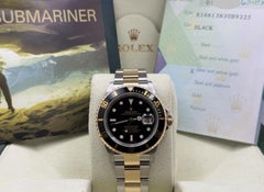 2005 Rolex Submariner 16613 40mm Black Dial 18k Yellow Gold Steel Box Paper