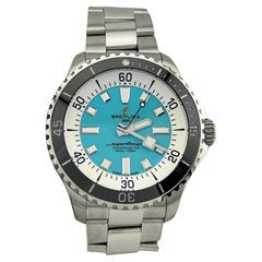 Breitling Superocean A17376 44mm Turquoise Blue Dial Stainless Box Paper