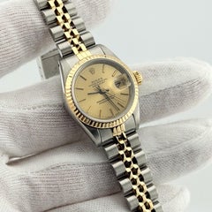Rolex Lady Datejust 69173, champagnerfarbenes Zifferblatt, 18 Karat Gelbgold, Edelstahl