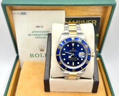 2002 Rolex Submariner Blue 16613 40mm 18k Yellow Gold Stainless Steel Box Papers