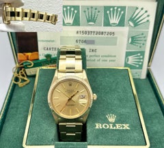 Rolex Date 15037 34mm Champagne Dial 14K Yellow Gold Box Papers