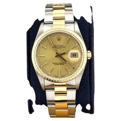 Rolex Date 15223 34mm Champagne Dial 18k Yellow Gold Steel Box Paper