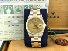 Rolex Date 15223 34mm Champagne Dial 18k Yellow Gold Steel Box Paper