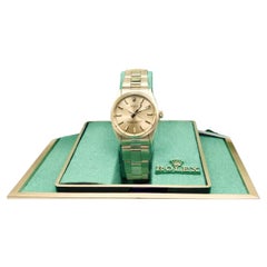 Rolex Oyster Perpetual 1002 34mm Champagne Dial 14k Yellow Gold Box Paper