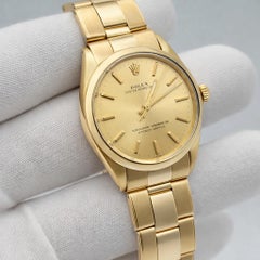 Rolex Oyster Perpetual 1002 34mm Champagne Dial 14k Yellow Gold Box Paper