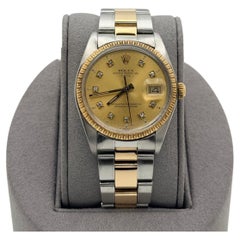 Rolex Date 1505 34mm Champagne Diamond Dial 18k Yellow Gold Stainless Steel