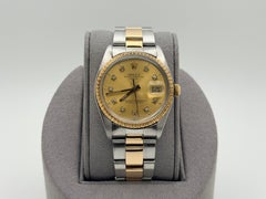 Rolex Date 1505 34mm Champagne Diamond Dial 18k Yellow Gold Stainless Steel