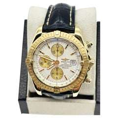 Breitling K13356 Chronomat Evolution 44mm avec cadran blanc en or jaune 18K