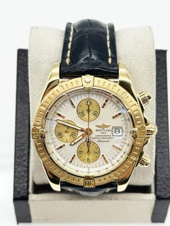 Breitling K13356 Chronomat Evolution 44mm avec cadran blanc en or jaune 18K