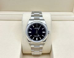2025 Rolex Oyster Perpetual 126000 36mm Black Dial Stainless Steel Box Papers