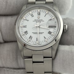 Rolex Date 15200 34mm White Roman Dial Stainless Steel Box Papers