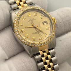 Rolex Date 15053 34mm Champagne Diamond Dial Diamond Bezel 18k Yellow Gold Steel