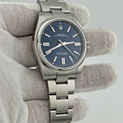 2025 Rolex Oyster Perpetual 124300 41mm Blue Dial Stainless Steel Box Papers