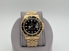 Rolex GMT Master II 16718 40mm Black Dial 18k Yellow Gold Jubilee
