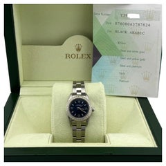 Rolex Oyster Perpetual 76080 24mm Blue Dial Diamond Bezel Steel Box Papers