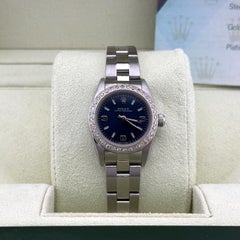 Rolex Oyster Perpetual 76080 24mm Blue Dial Diamond Bezel Steel Box Papers