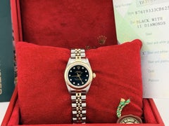 Rolex Ladies Oyster Perpetual 76193 Black Diamond Dial 18k Gold Steel Box Paper