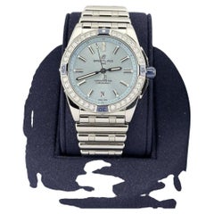 Breitling Super Chronomat A17356 38 mm, lunette sertie de diamants, cadran bleu, boîtier en acier, livret d'accompagnement