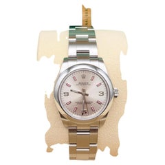 Rolex Oyster Perpetual Midsize 177200, 31 mm, cadran argenté et rose, boîtier en acier, avec papiers