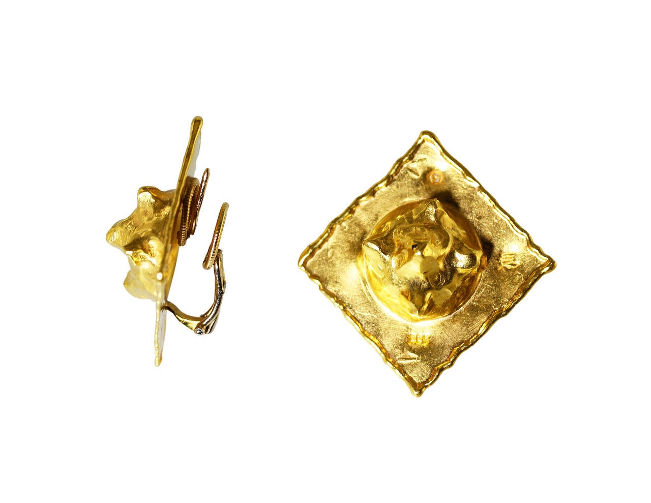 Pair of 22 karat yellow gold earclips by Jean Mahie, of square design with textured bombe centers, gross weight 20.5 grams, measuring approximately 1 by 1 inch, with maker's mark JM for Jean Mahie, stamped 22K.  A unique pair of earclips with depth